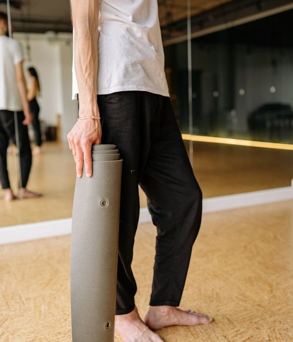 Man in a state of deep concentration during a physical exercise routine.